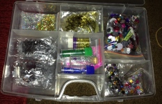 The evil glitter box. Have learnt the hard way to keep things in small bags.
